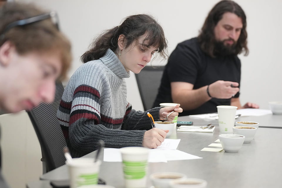 Anthropology students tasting various regional coffees.