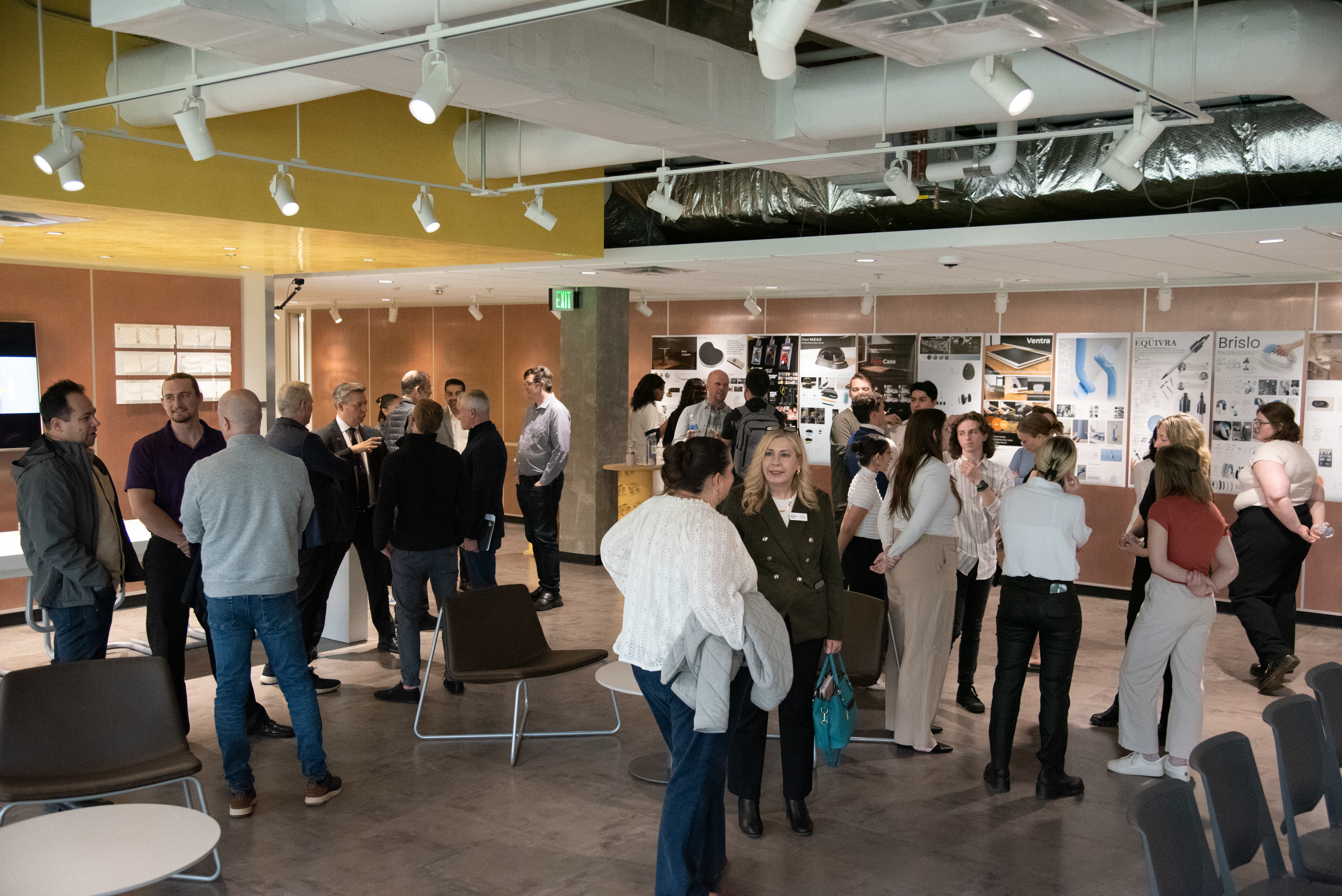 A room packed full of people.