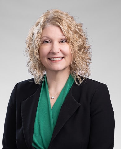 A professional headshot of Jen Bott