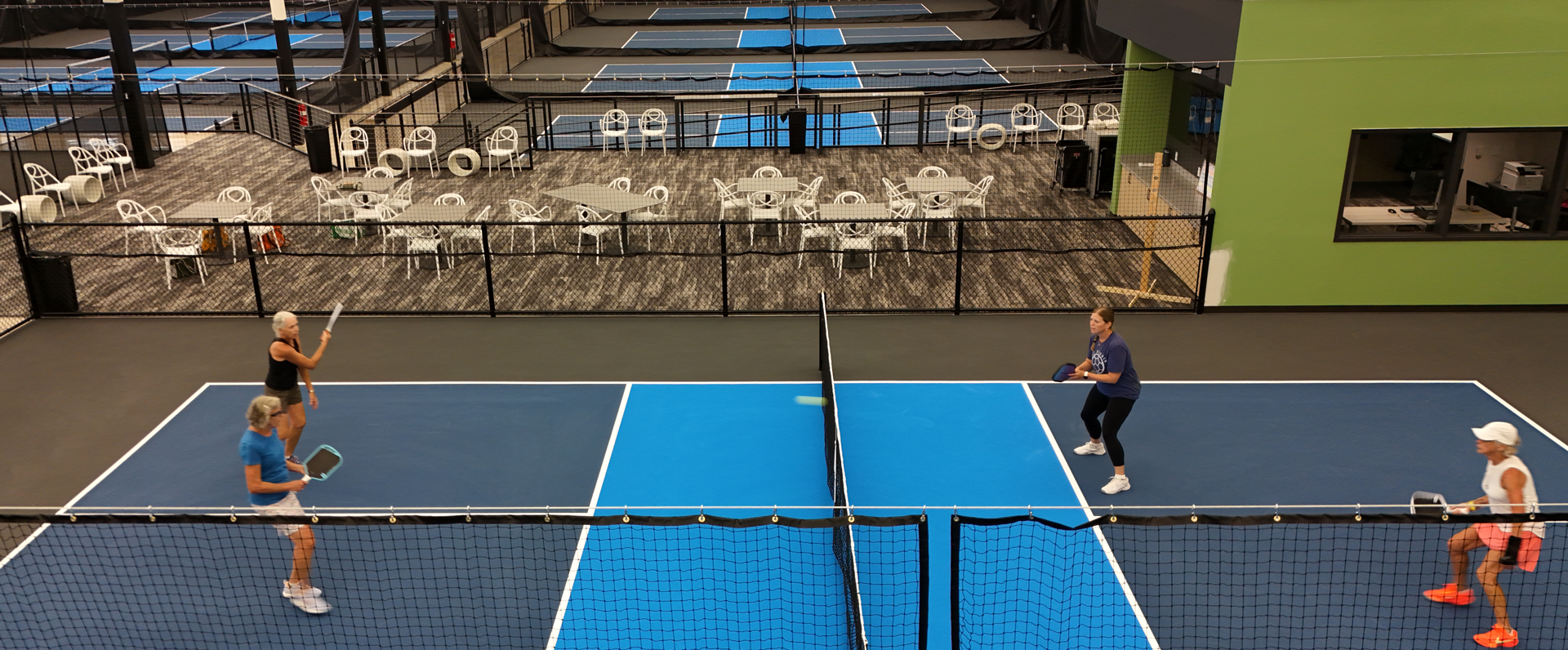 Arial of ladies playing pickleball at the Latitude 42 Pickleball Complex
