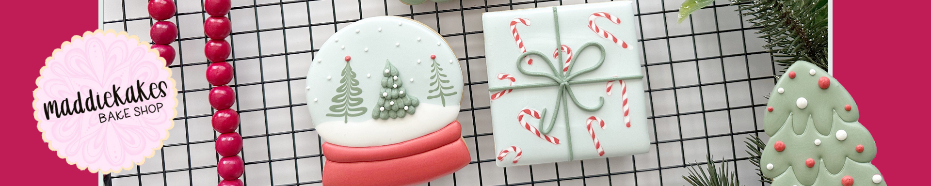 Three colorfully decorated Christmas Cookies