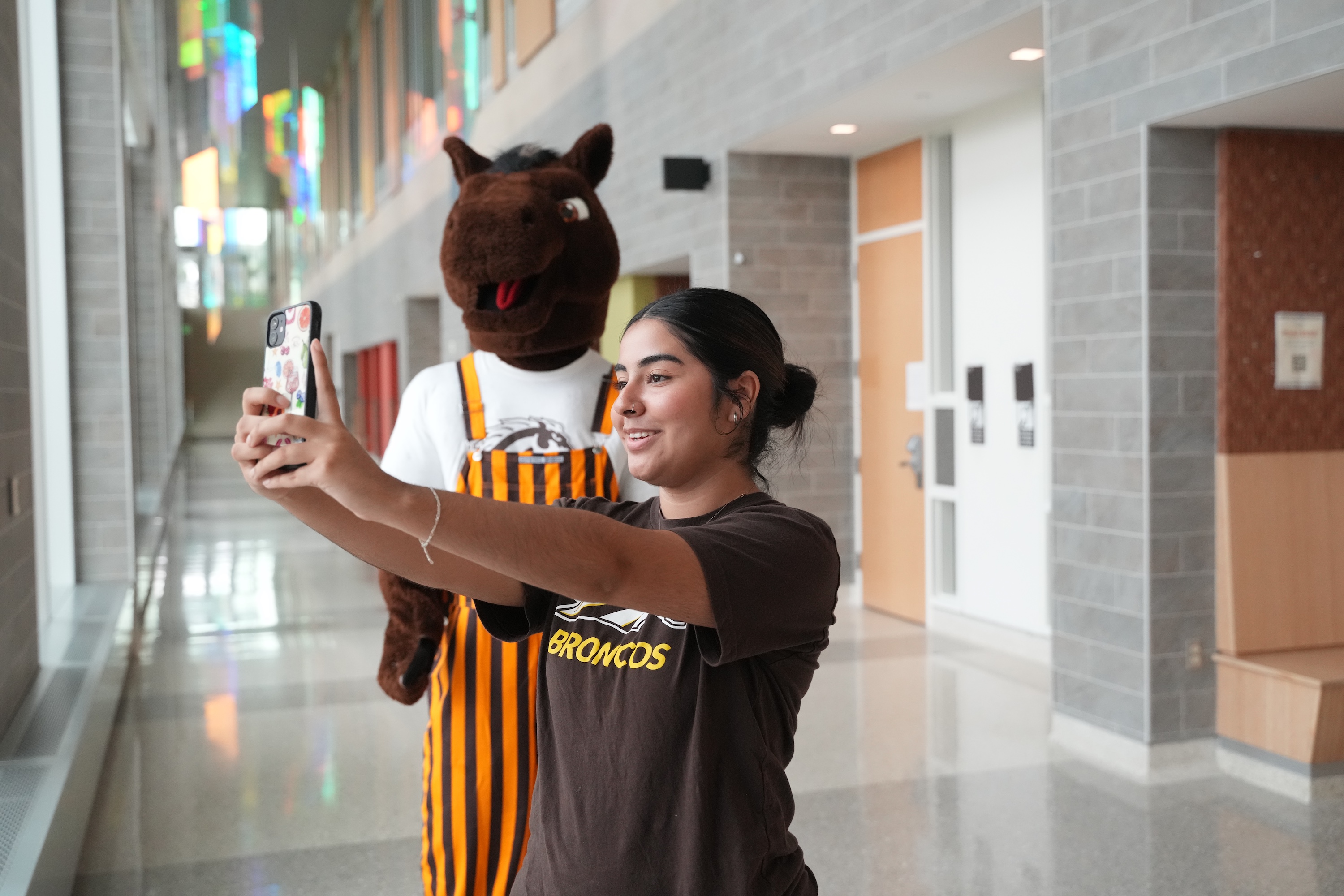 Leslie taking a photo with Buster.