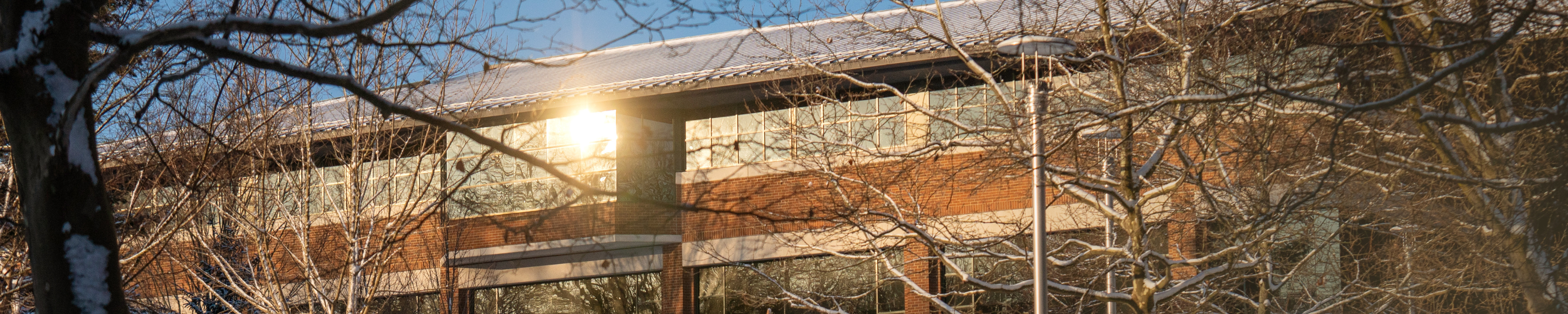 winter campus building with sun shining