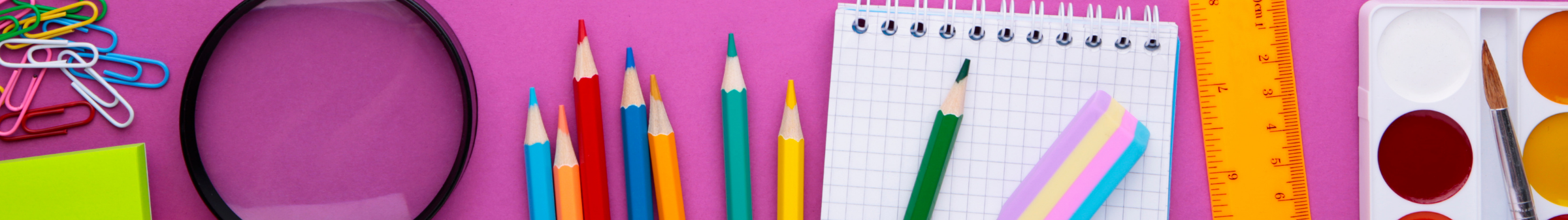 school supplies on pink background