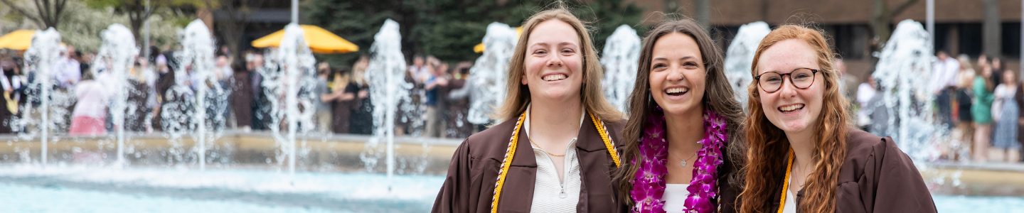 wmu students in front of miller fountain after graduation commencement