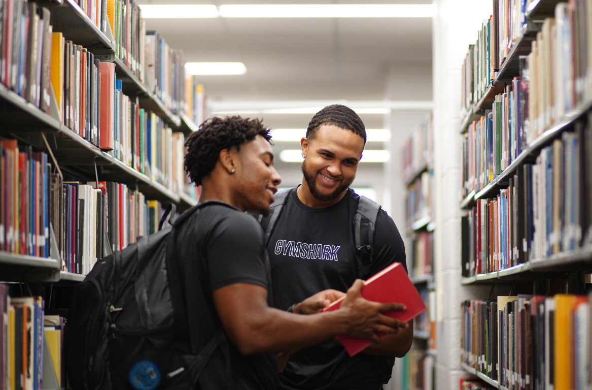 Two students studying in Waldo Library