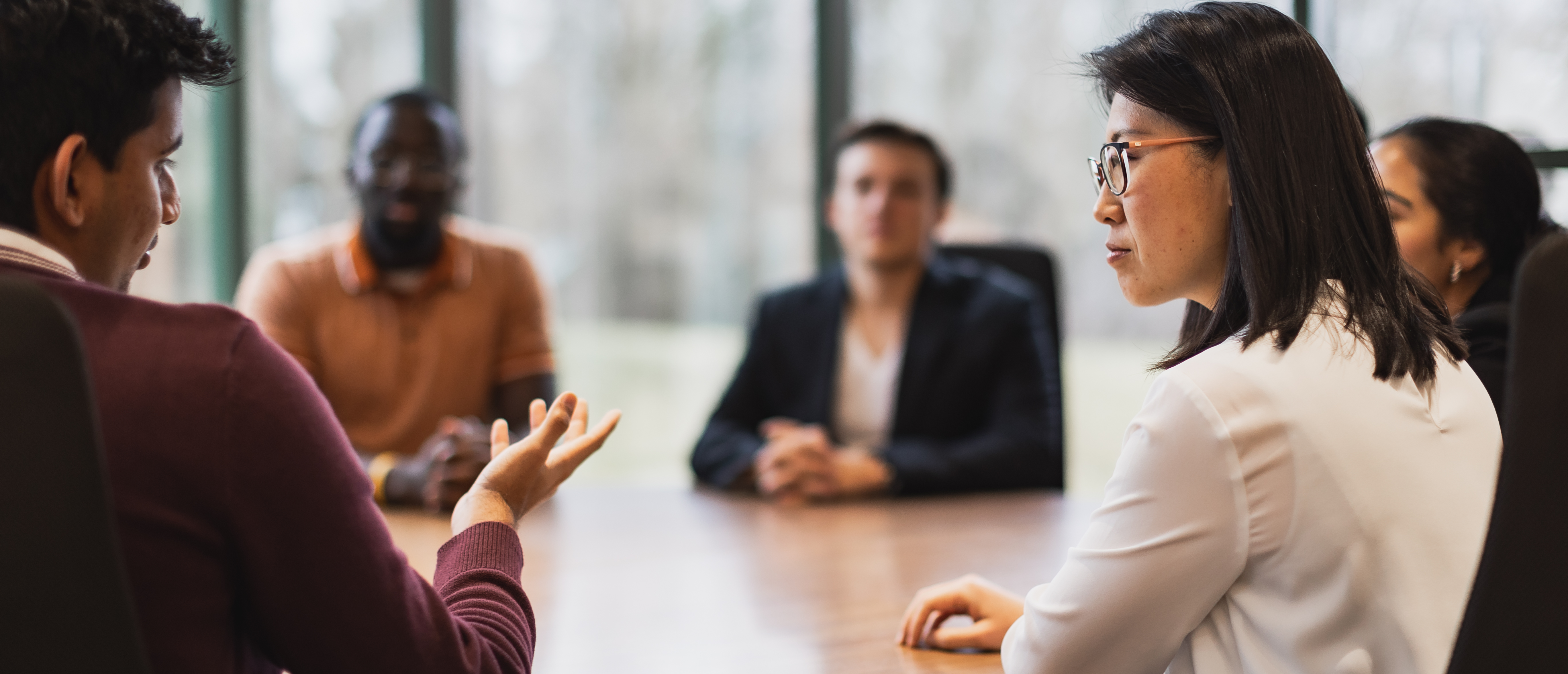 A group of instructors in a discussion