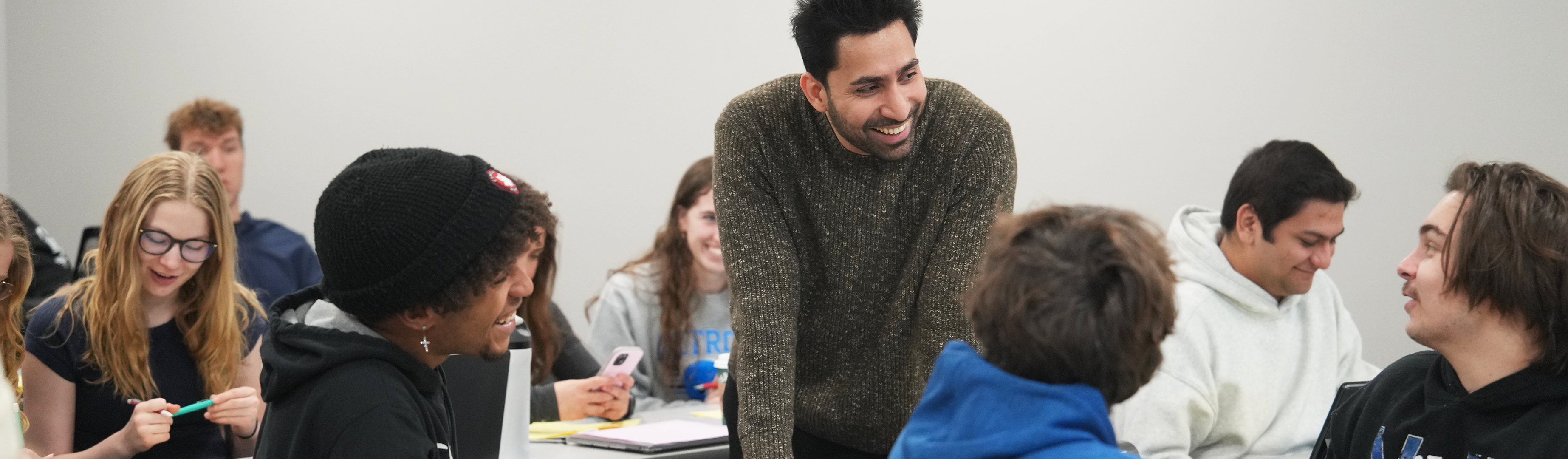 An instructor with a group of students.