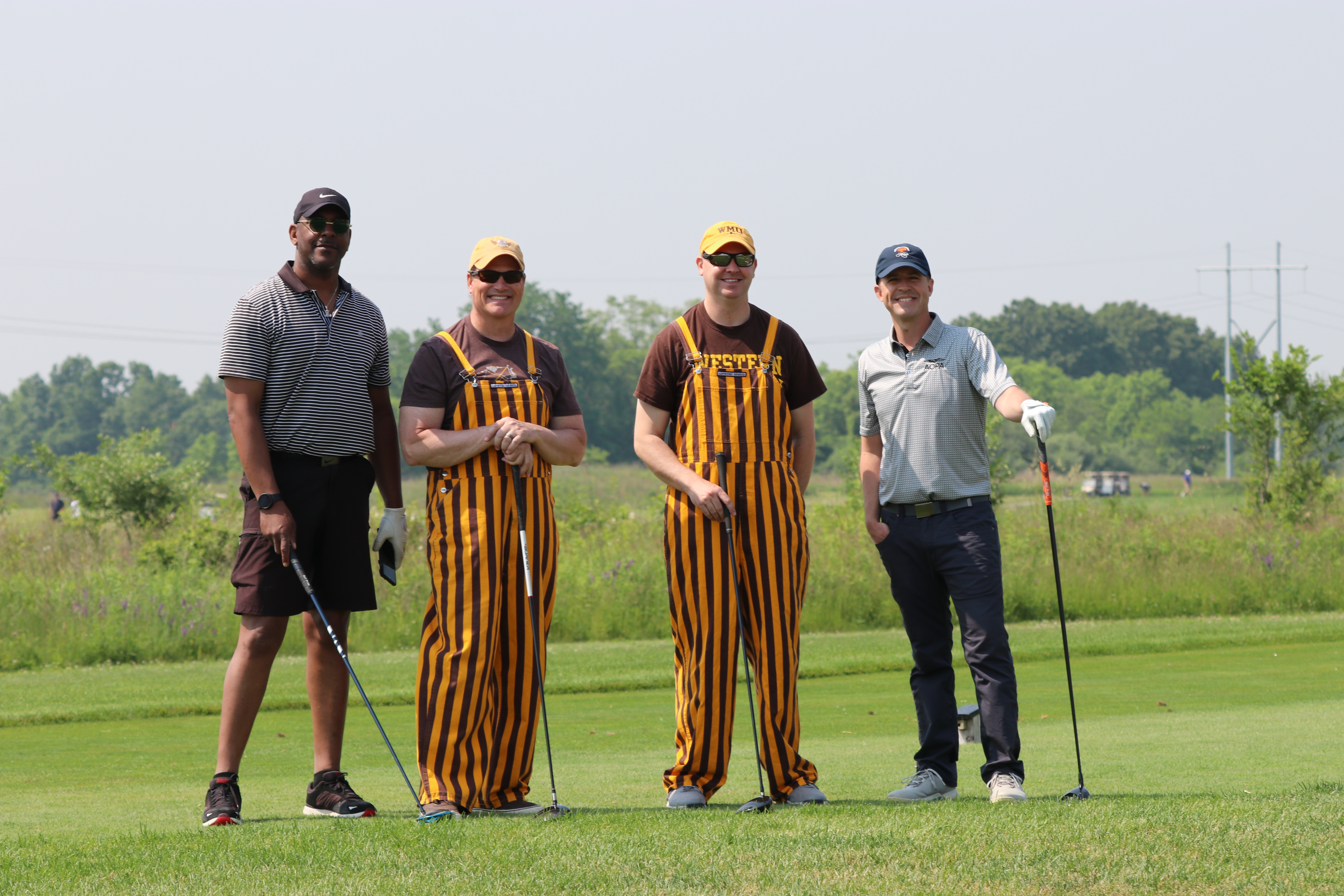 WMU Aviation Golf Outing with four participants