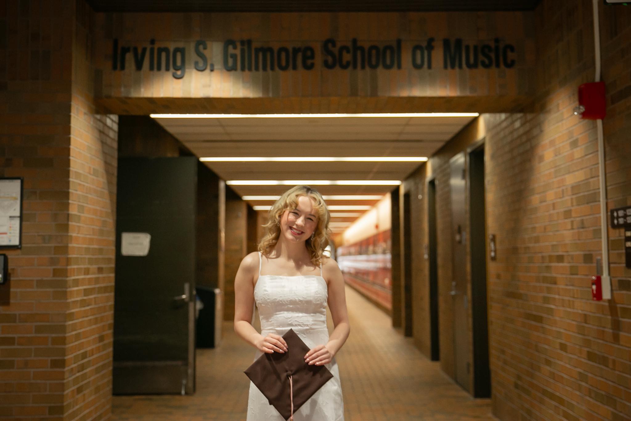Madison Vogel, a music education student in cap and gown.