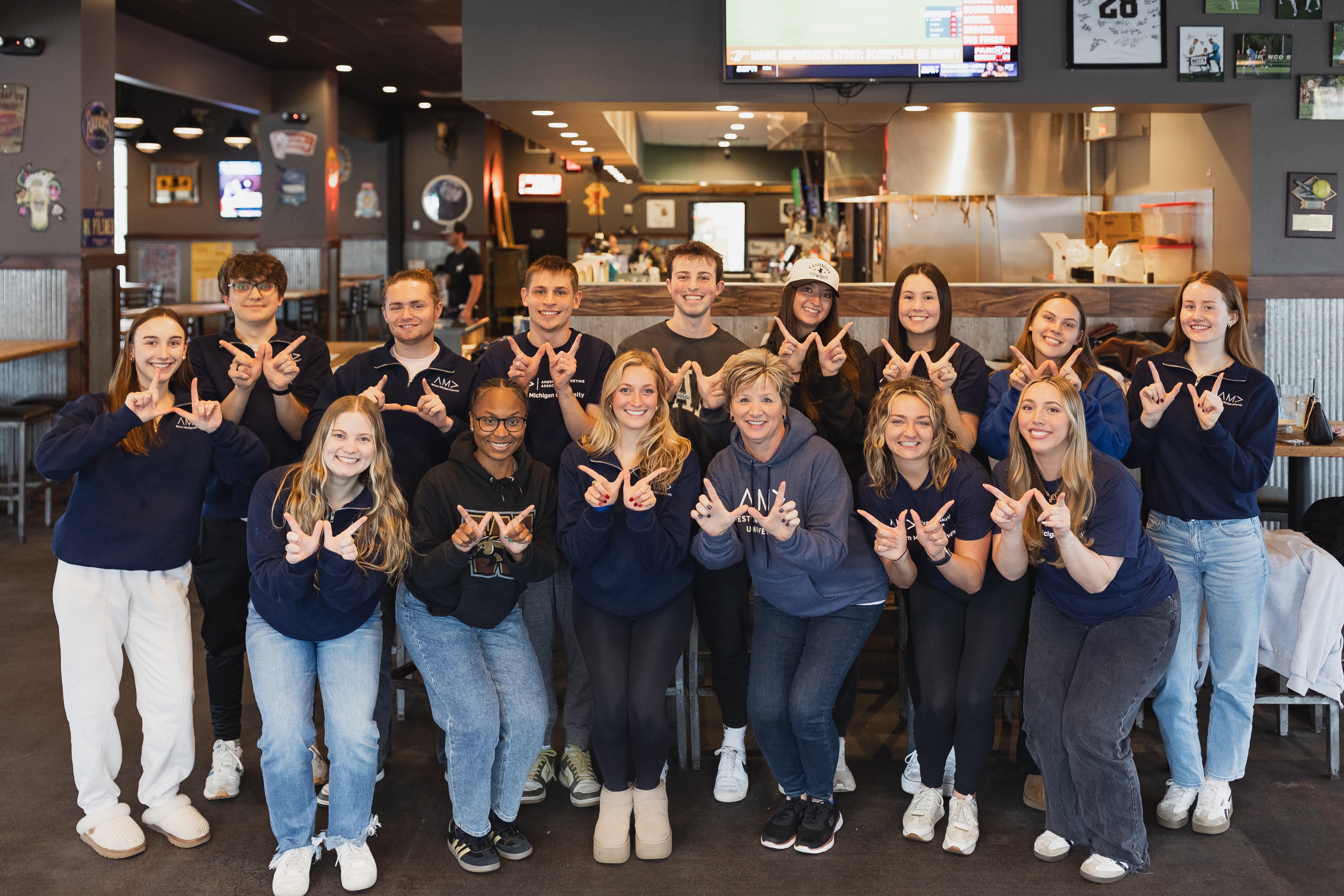 JoAnn Atkin with members of the American Marketing Association student chapter at WMU