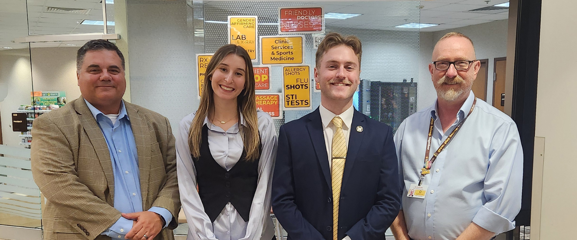 SIHP students at their internship at the WMU Sindecuse Health Center with staff.