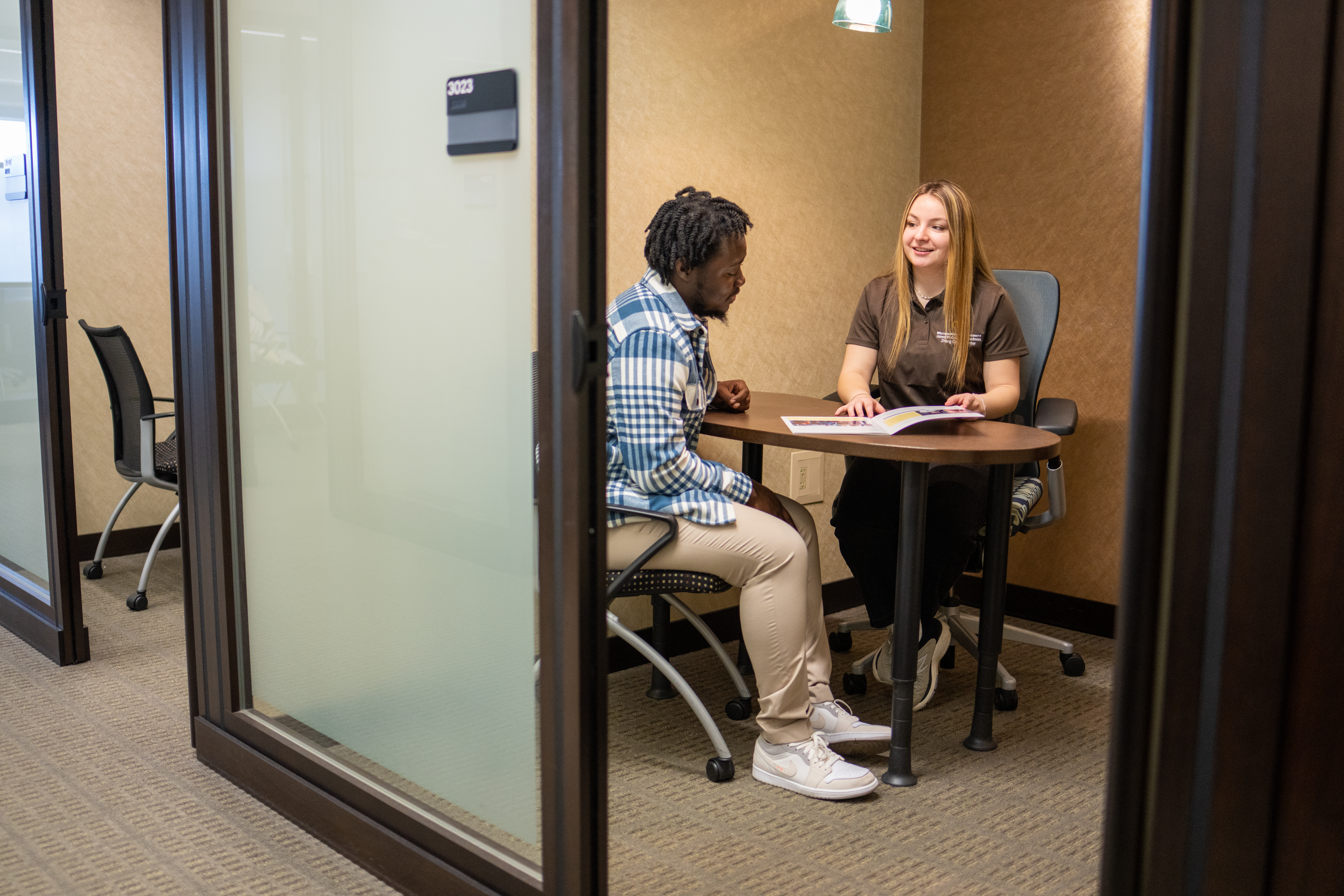 Student meets with advisor.