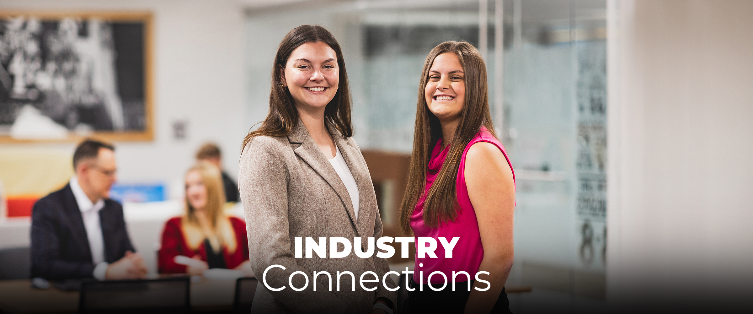 Two Food Marketing students inside of the newly-built Food Marketing Hub. With the title of the magazine: "Industry connections" across the middle