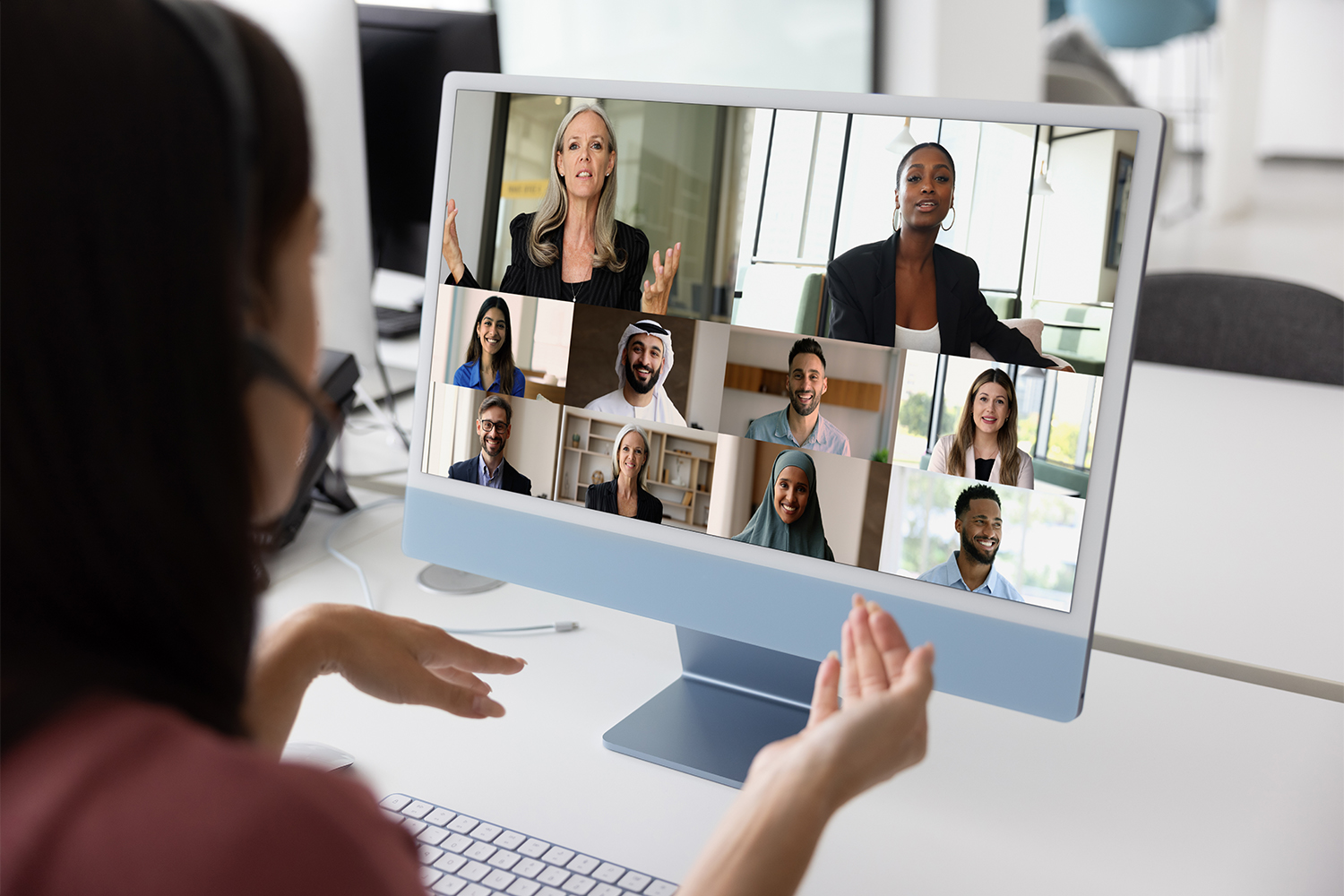 Student looking at a computer screen during a virtual meeting