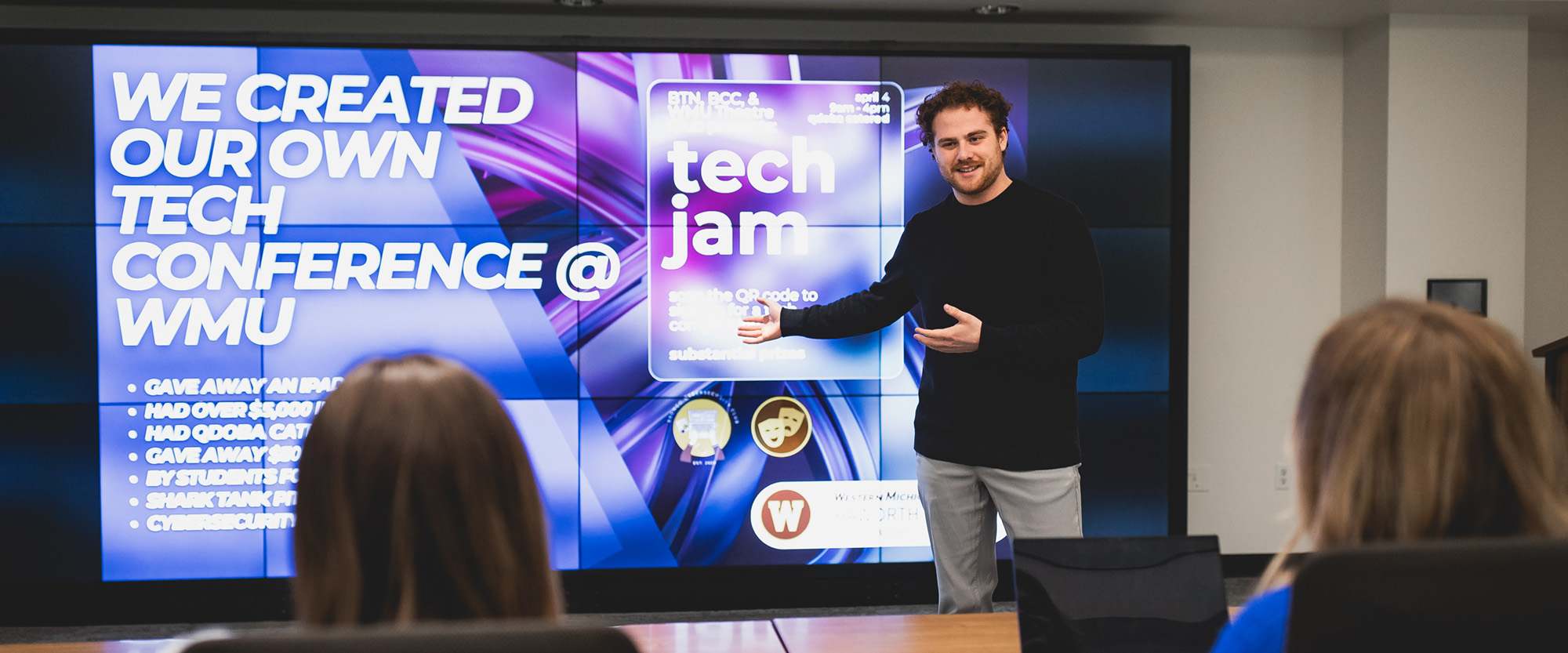 Caden Carr presenting in a conference room