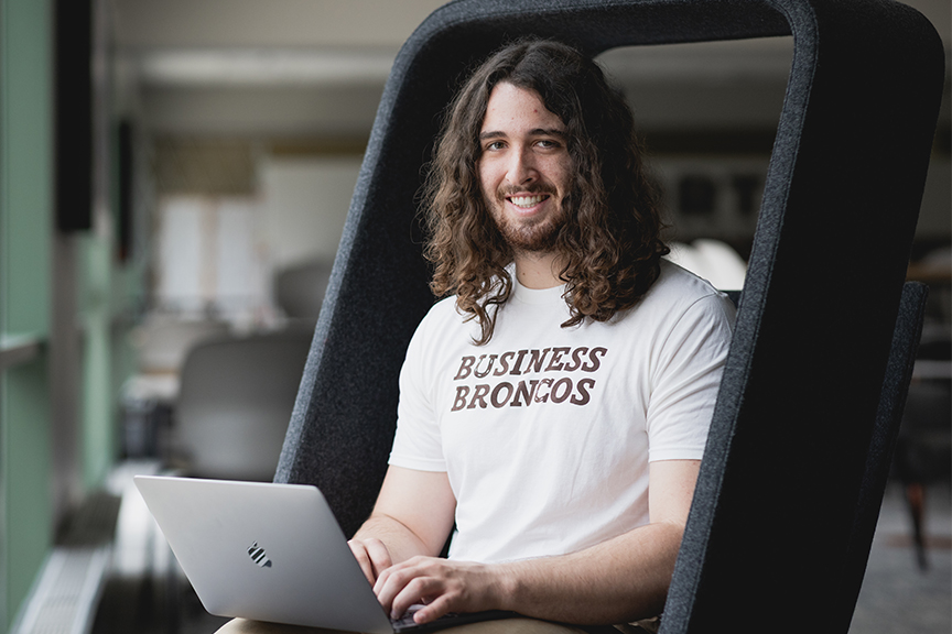 Graduate food marketing student sitting