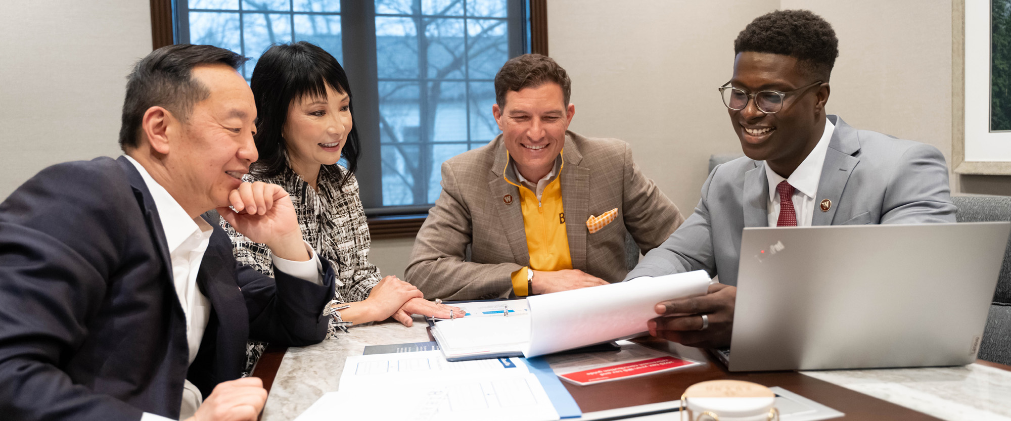 Mo Tall consulting with Russ Kavalhuna and Lynn and Charles Zhang