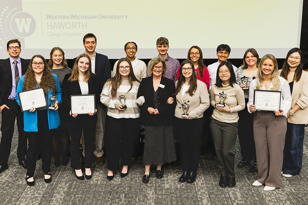 Students receiving scholarships at a banquet