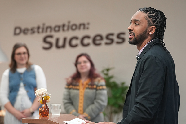 An alumnus speaking at the Student Professional Readiness Series Celebration