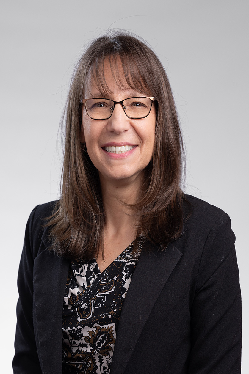 A professional headshot of Michelle Adams for the Cabinet Directory.