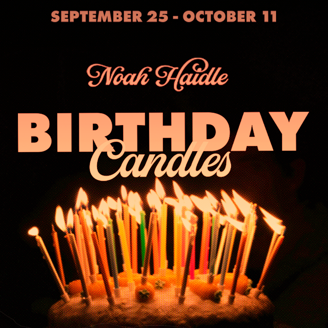 A birthday cake with candles lit and the words "Birthday Candles"