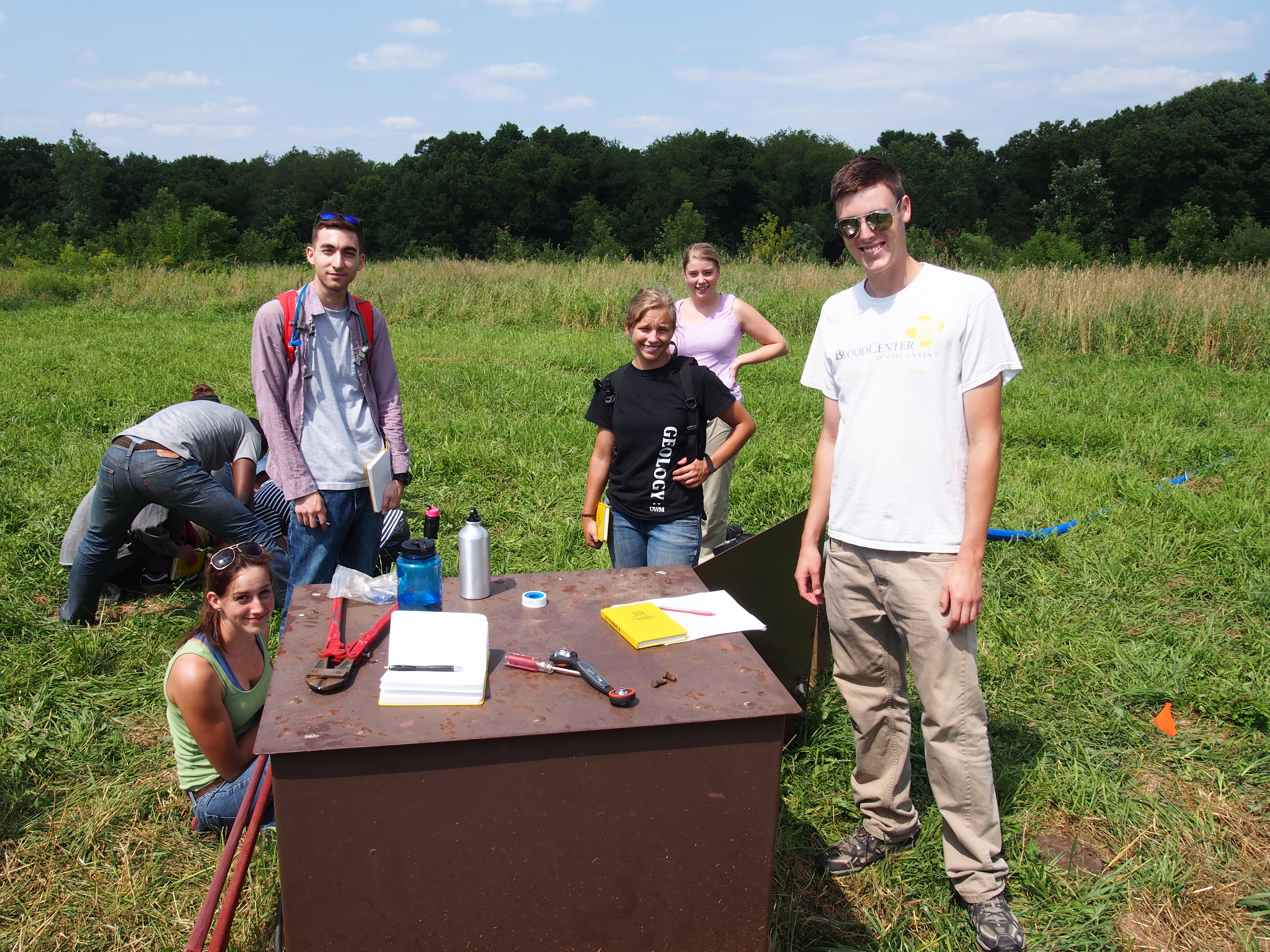 student conducting an aquifer test