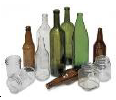 A collection of glass bottles of different sizes and colors.