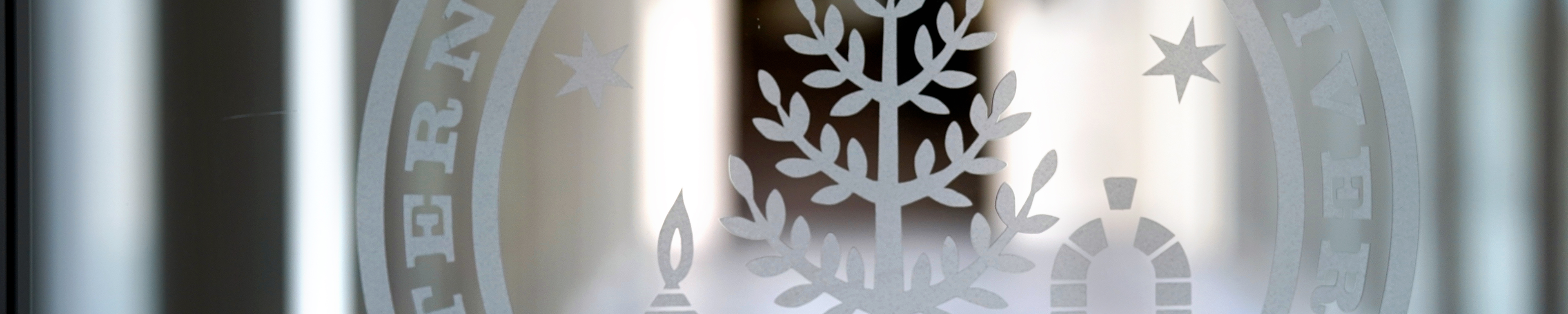 WMU Seal etched in glass on campus