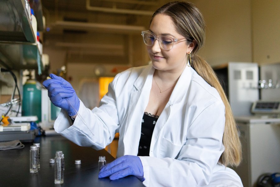Kendall Nore working in the chemical engineering lab.