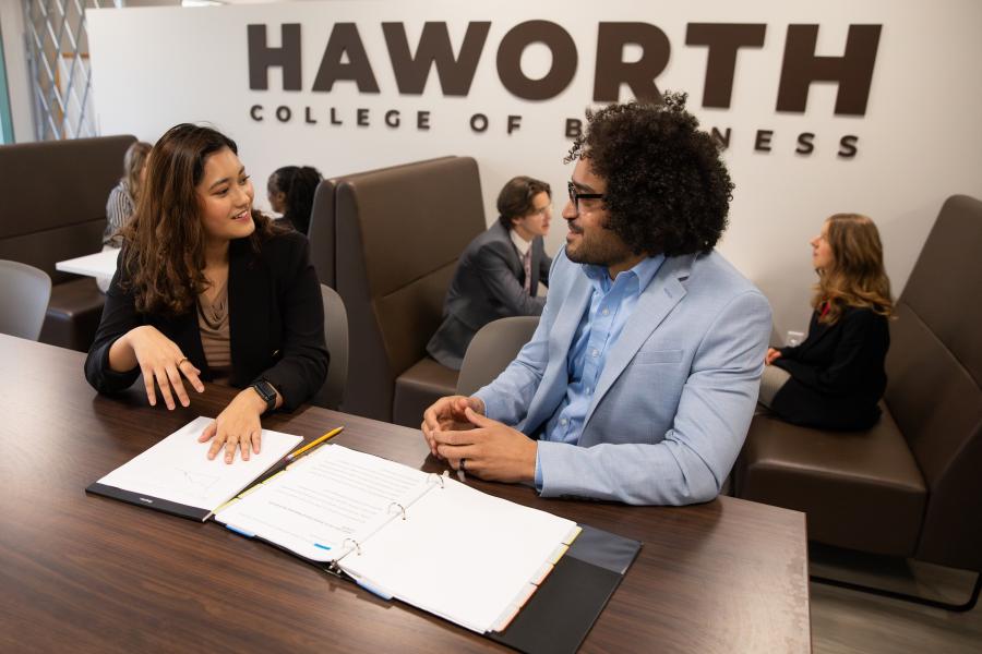 Two students in the Haworth College of Business talking