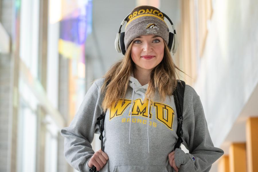 Student in Sangren Hall in WMU gear