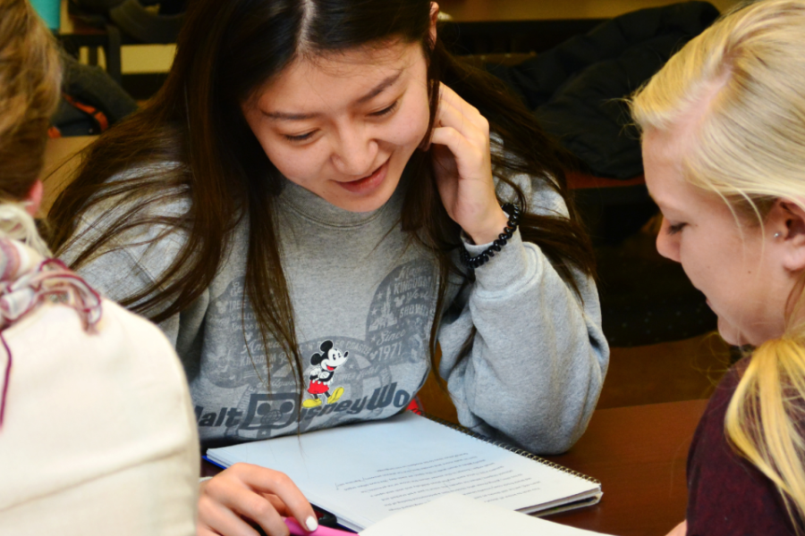 Students working together at a table.
