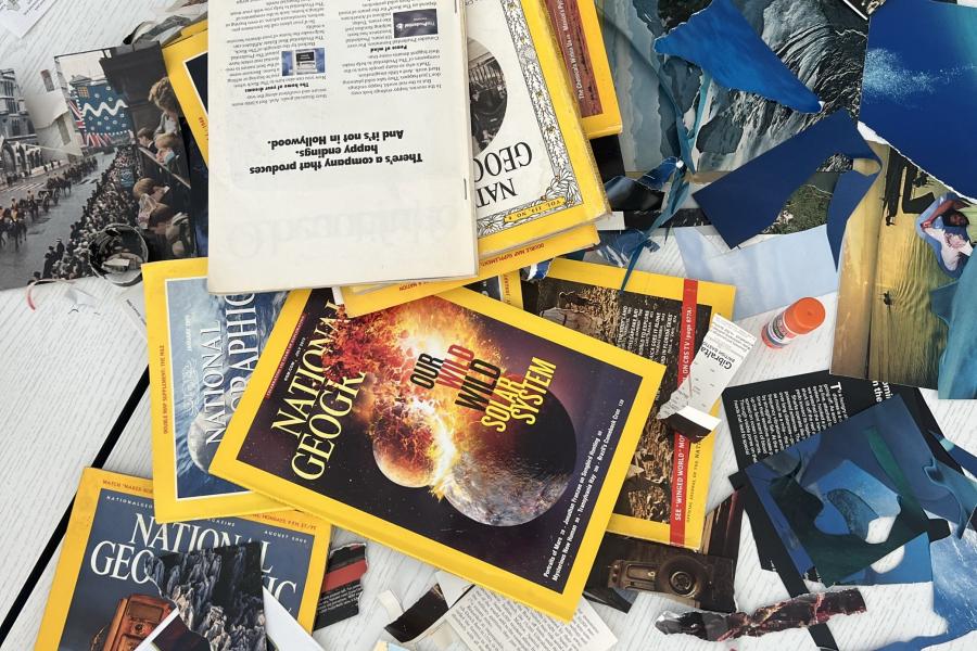 National Geographic magazines spread out on a table