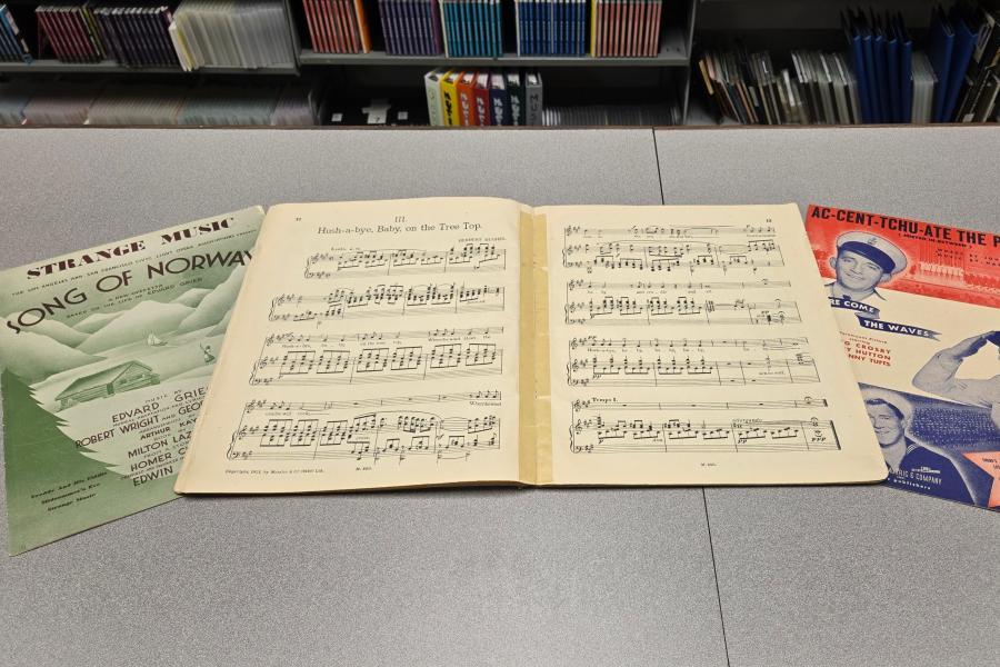 Three pieces of song sheet music from the Sheet Music Collection at Waldo Library.