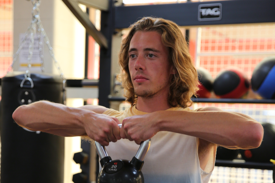 A student using a kettlebell at the SRC