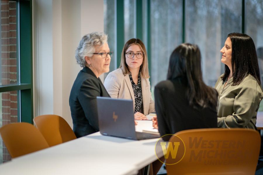 Grad students sitting around table
