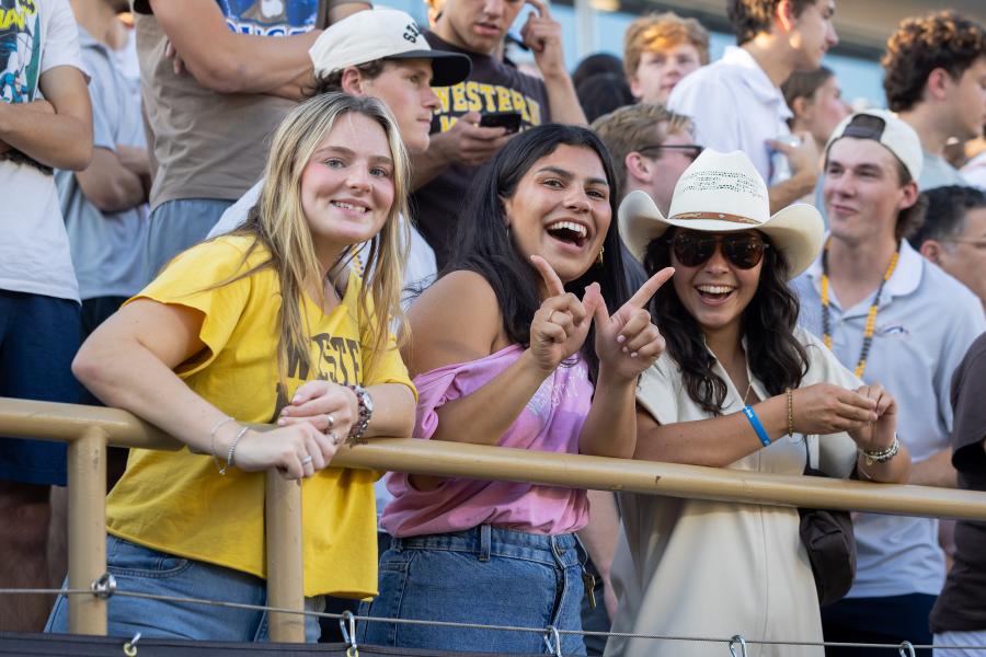 CommUniverCity game students in stands
