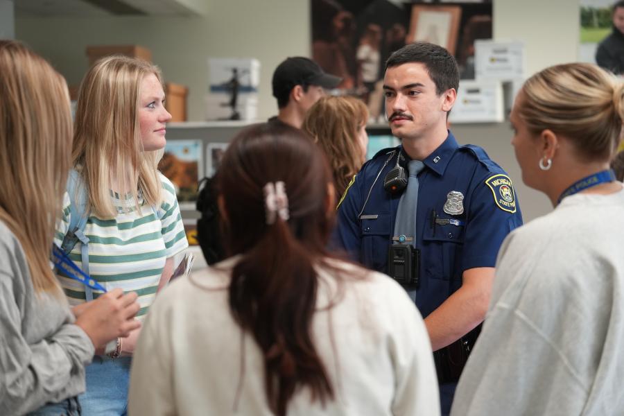 Trooper Montroy and students at the Fall 2025 Open House