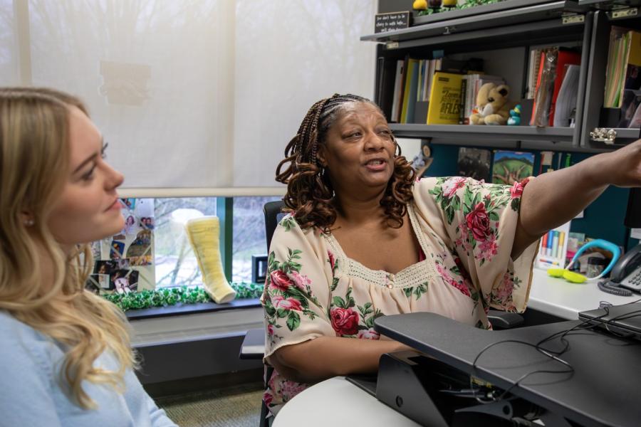 student talking to advisor