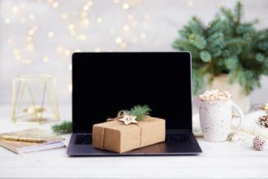 A package sits on a laptop