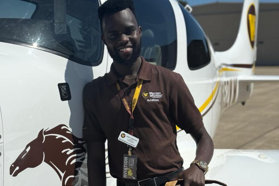 Man in front of plane
