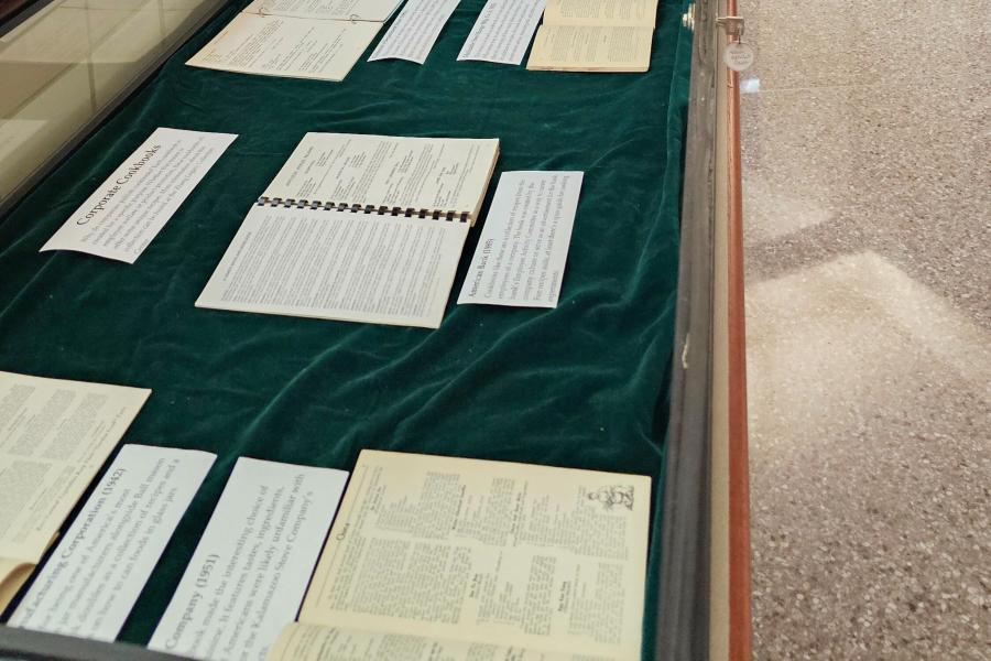 Exhibit case at Waldo Library about corporate cookbooks.