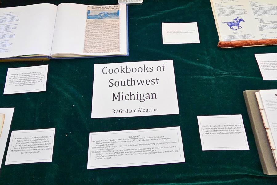 Exhibit case at Waldo Library about southwest Michigan cookbooks.