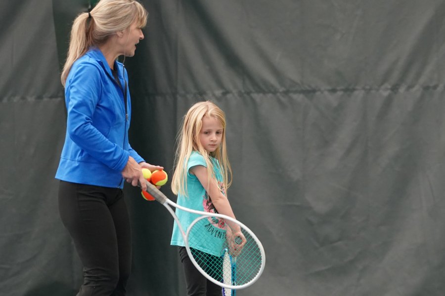 Jody and young girl tennis