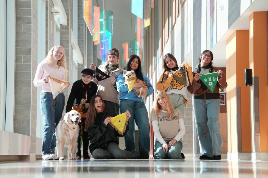 fashion students with therapy dogs