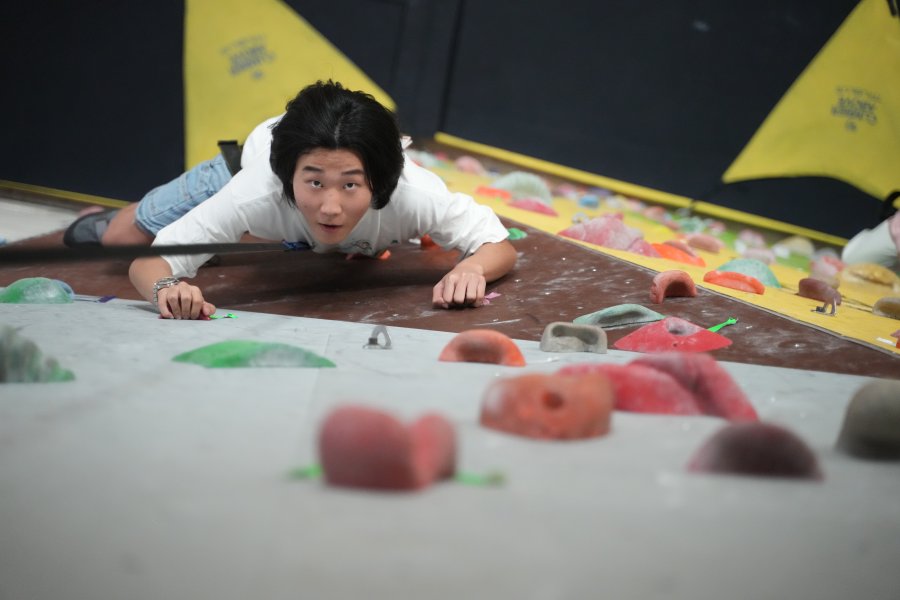 Student using the SRC climbing wall