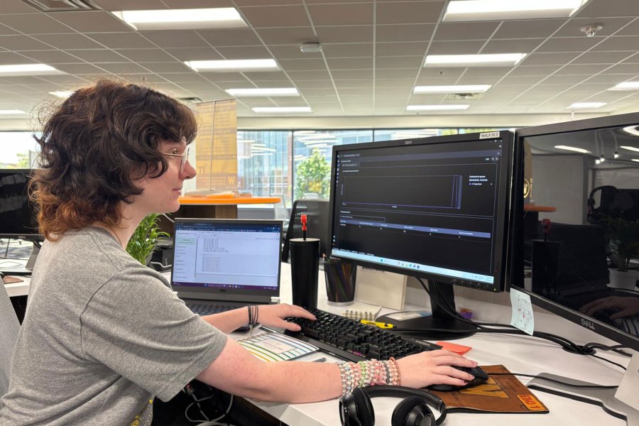 Hannah Craft working at the Technology Help Desk, as a student tech, in the University Computing Center