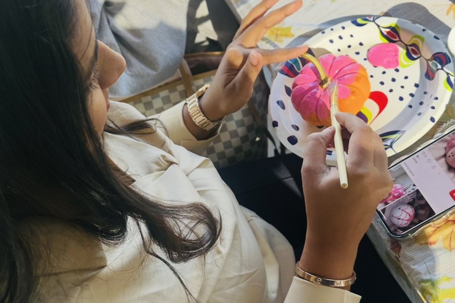 International student from India, Trivedi, participates in arts and crafts. 