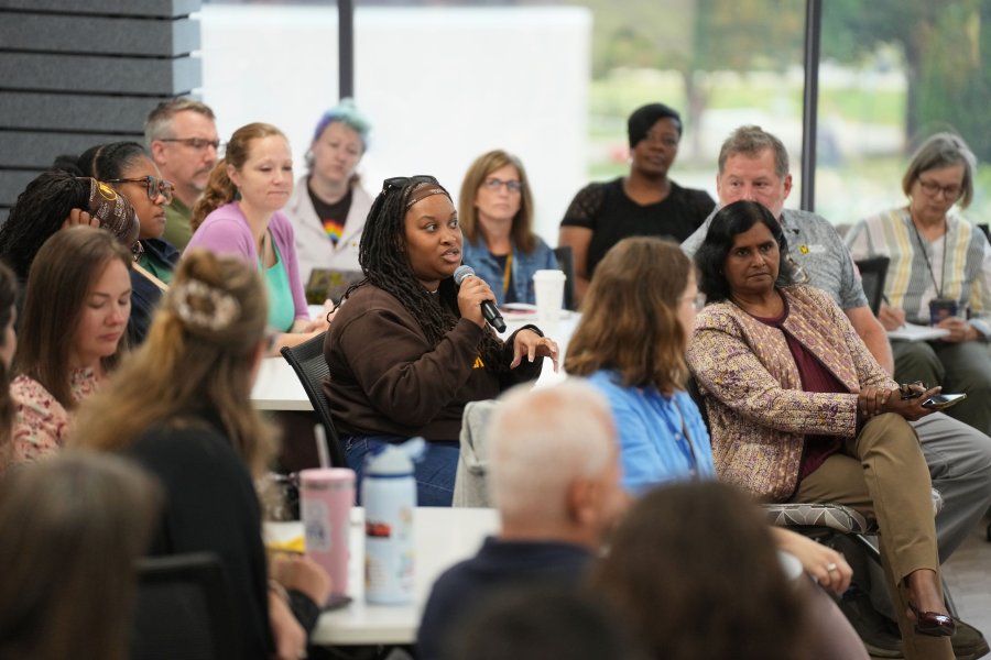 Western Michigan University employee talking during a Presidential Listening Tour session in 2025 in Waldo Library Multipurpose Room 3016.